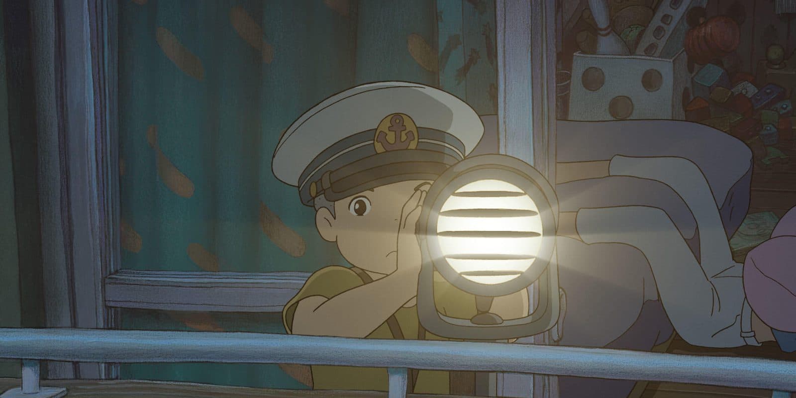 still from Ponyo: a ship captain flashing a signal lamp at night