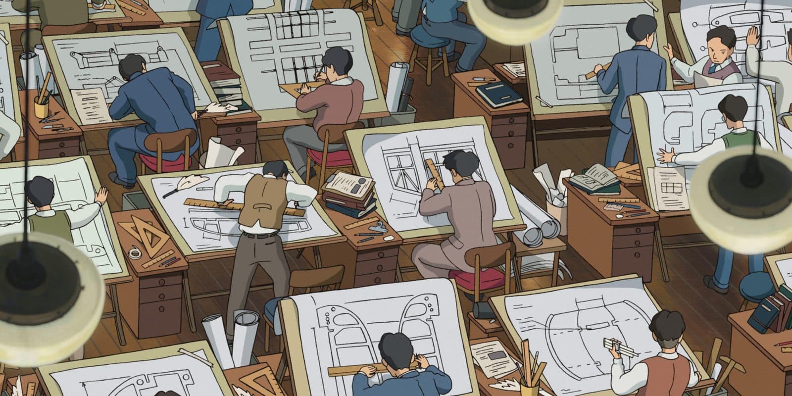 still from The Wind Rises: engineers bent over drafting tables in a 1920s aircraft design office