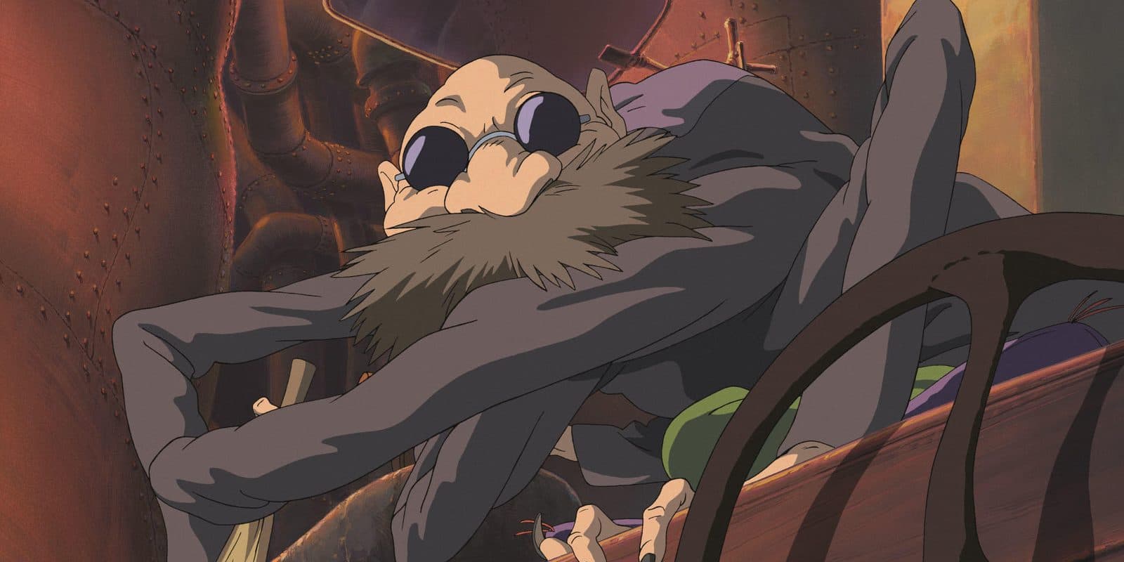 still from Spirited Away: Kamaji the boiler man, many arms busy, surrounded by soot sprites in the boiler room